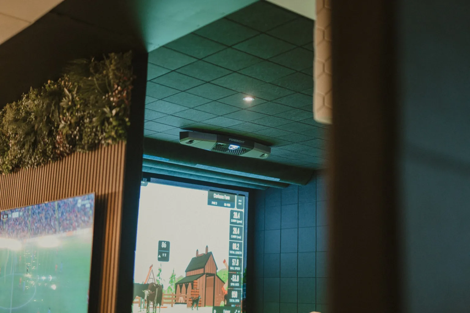 The Falcon overhead launch monitor keeps the setup clean while delivering pinpoint accuracy shot after shot.