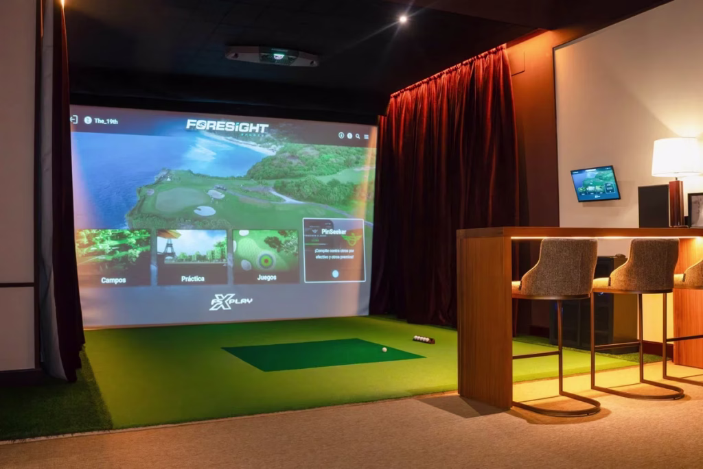 Indoor golf simulator with virtual screen. Image is used as part of Foresight Sports EU success stories.